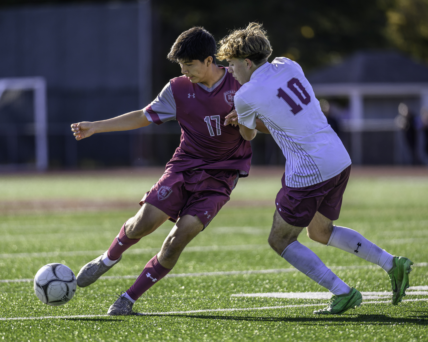 East Hampton junior Sean Perez works off  Deer Park junior Noah Romero.   MARIANNE BARNETT