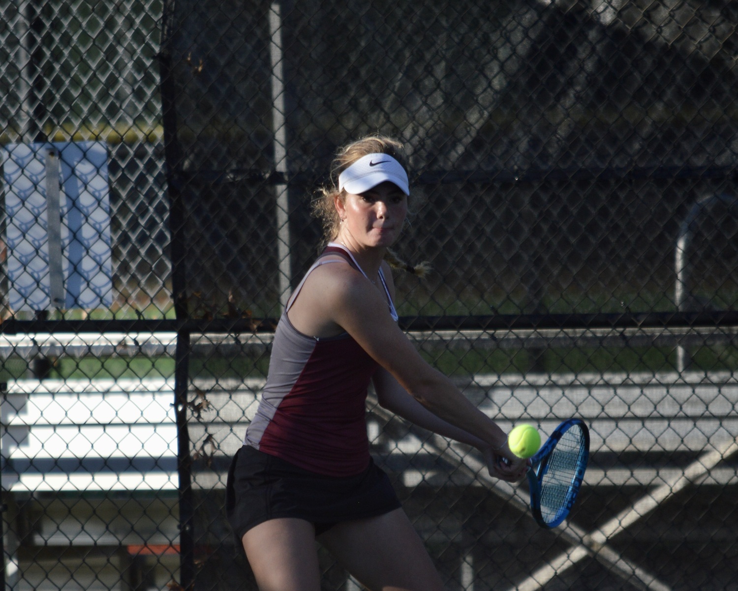 Senior Caleigh Barletta playing in what would be her final match of her East Hampton tennis career at Commack on Wednesday.  GAVIN MENU