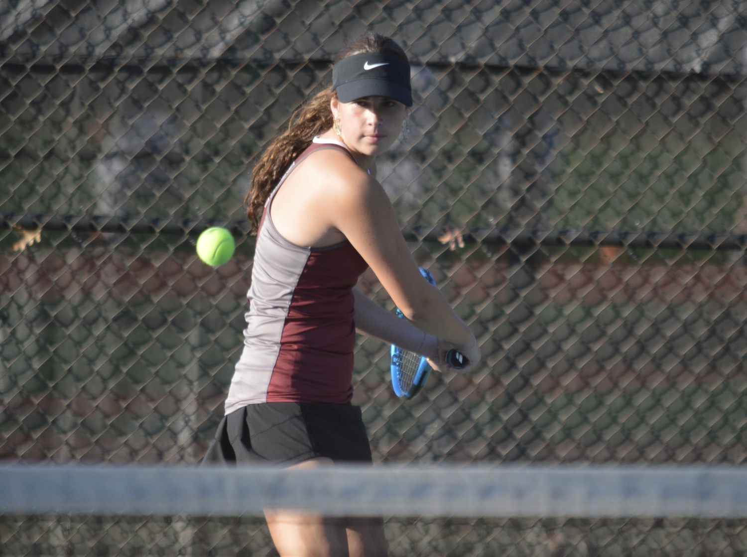 Junior Colleen McKee eyes a backhand. GAVIN MENU