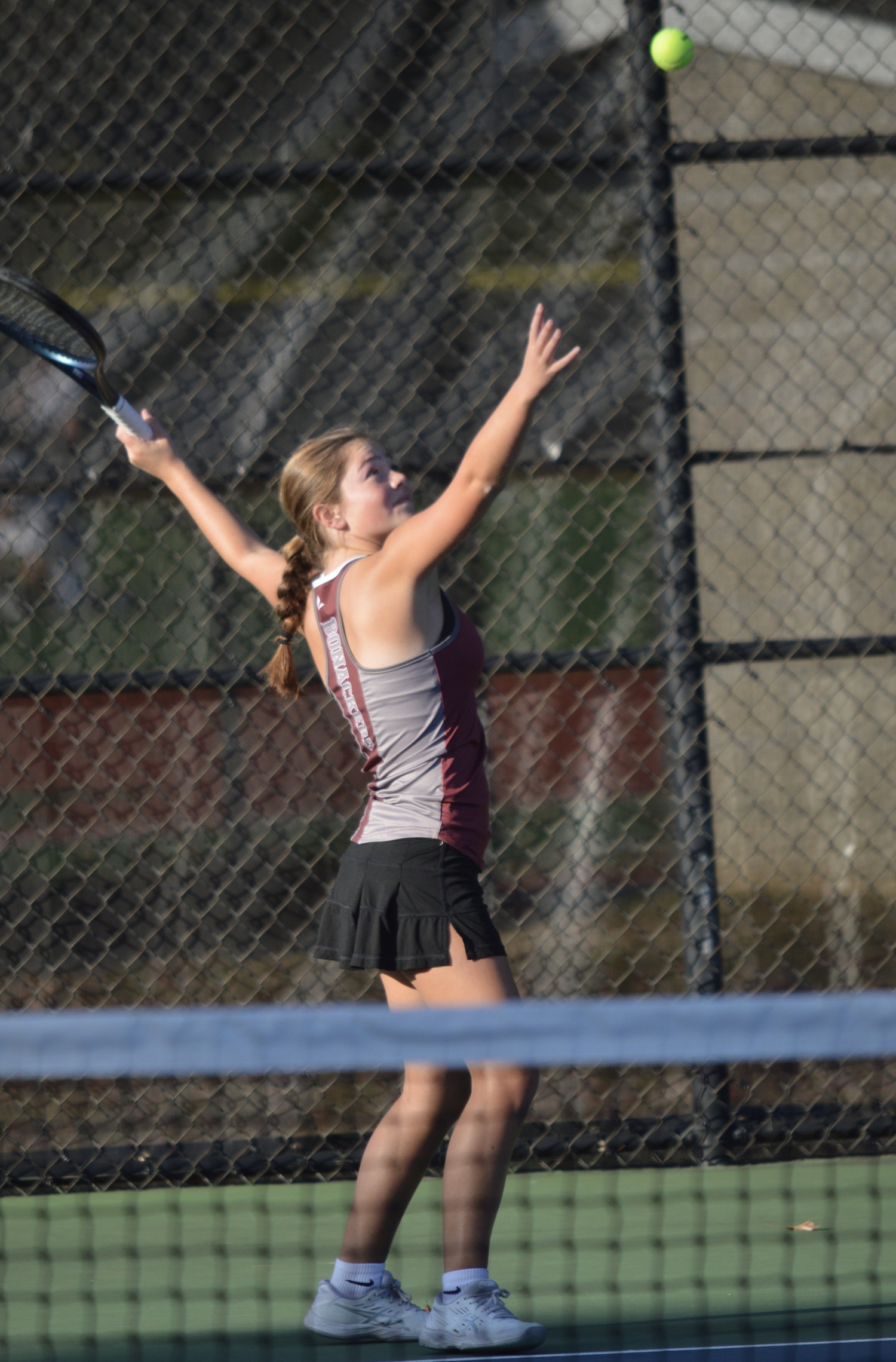 Dylan Centalonza, an eighth-grader who played doubles this season with her twin sister, Fallon, serving against Commack.  GAVIN MENU