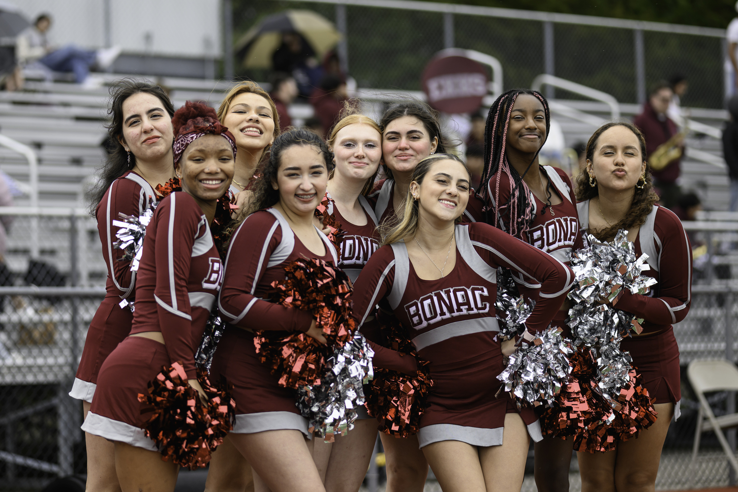 East Hampton cheerleaders braved the elements on Saturday afternoon to root on their classmates.   MARIANNE BARNETT