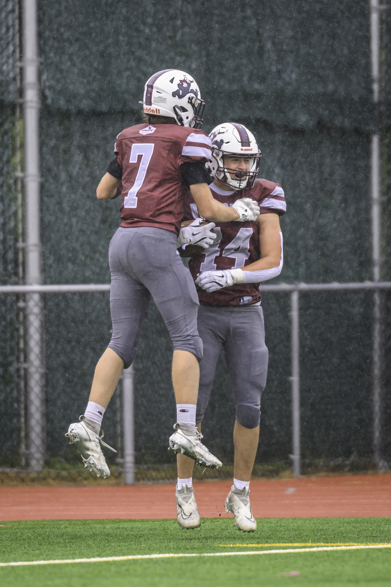 Jackson Ronick celebrates his touchdown with Livs Kuplins in the end zone.   MARIANNE BARNETT