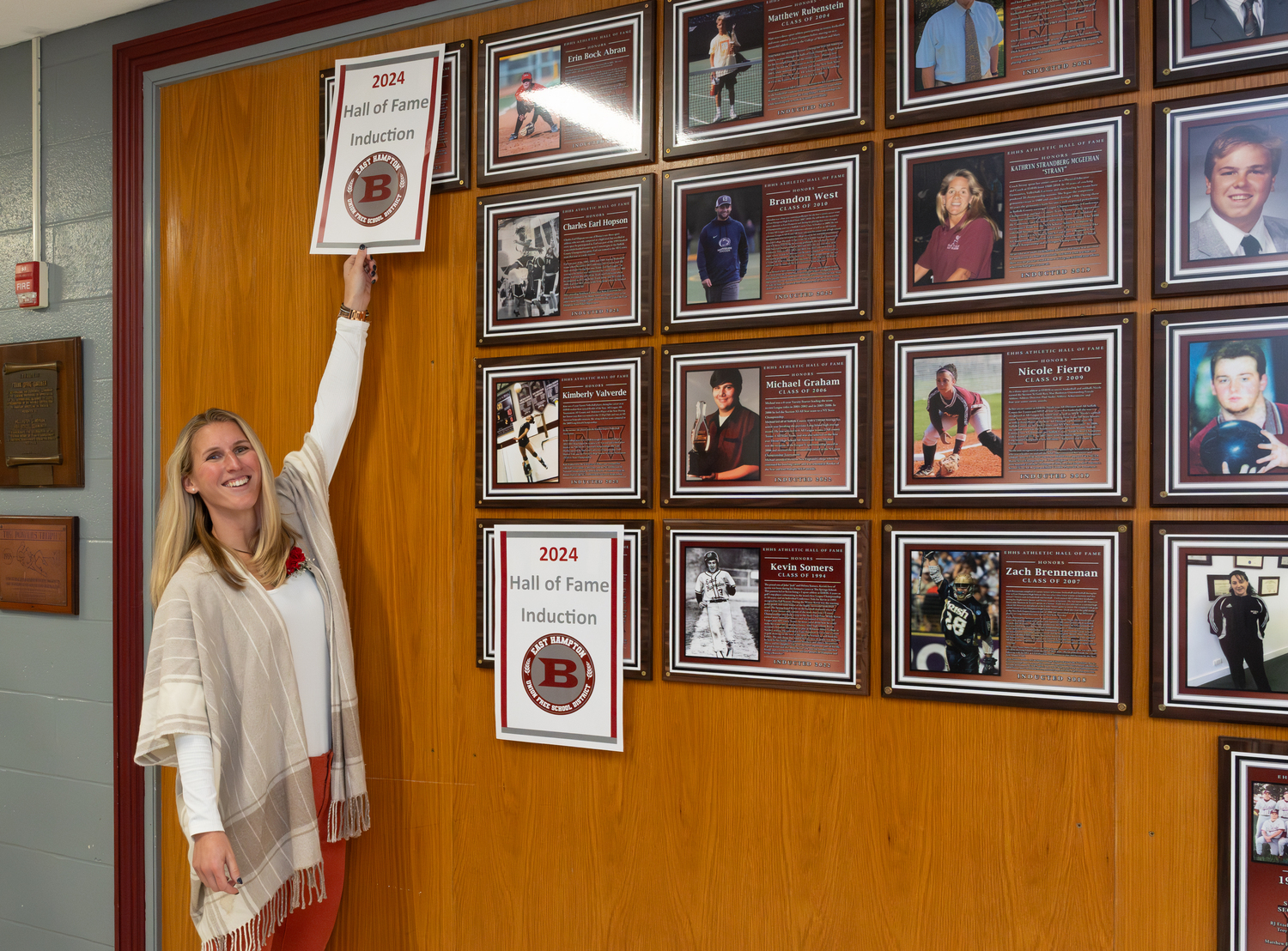 Ashley West about to unveil her Hall of Fame plaque.   RON ESPOSITO