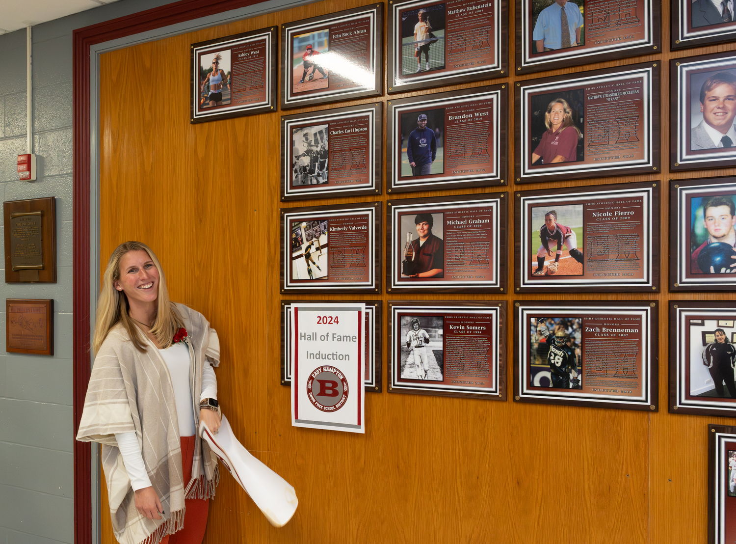 Ashley West unveils her Hall of Fame plaque.   RON ESPOSITO