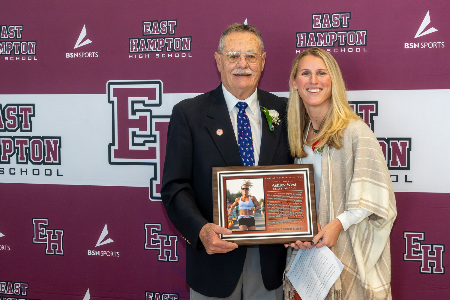 Ashley West with her former coach Bill Herzog who she credited much of her running success in her life to.   RON ESPOSITO