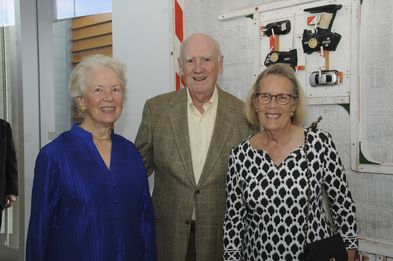 Alice and Kevin Concagh with Carey Millard at the Bridgehampton Museum's Cocktails at the Bridge celebrating the life and legacy of former Board Member Phyllis Davis not only for what she did for the museum, but for the Bridgehampton community.     RICHARD LEWIN