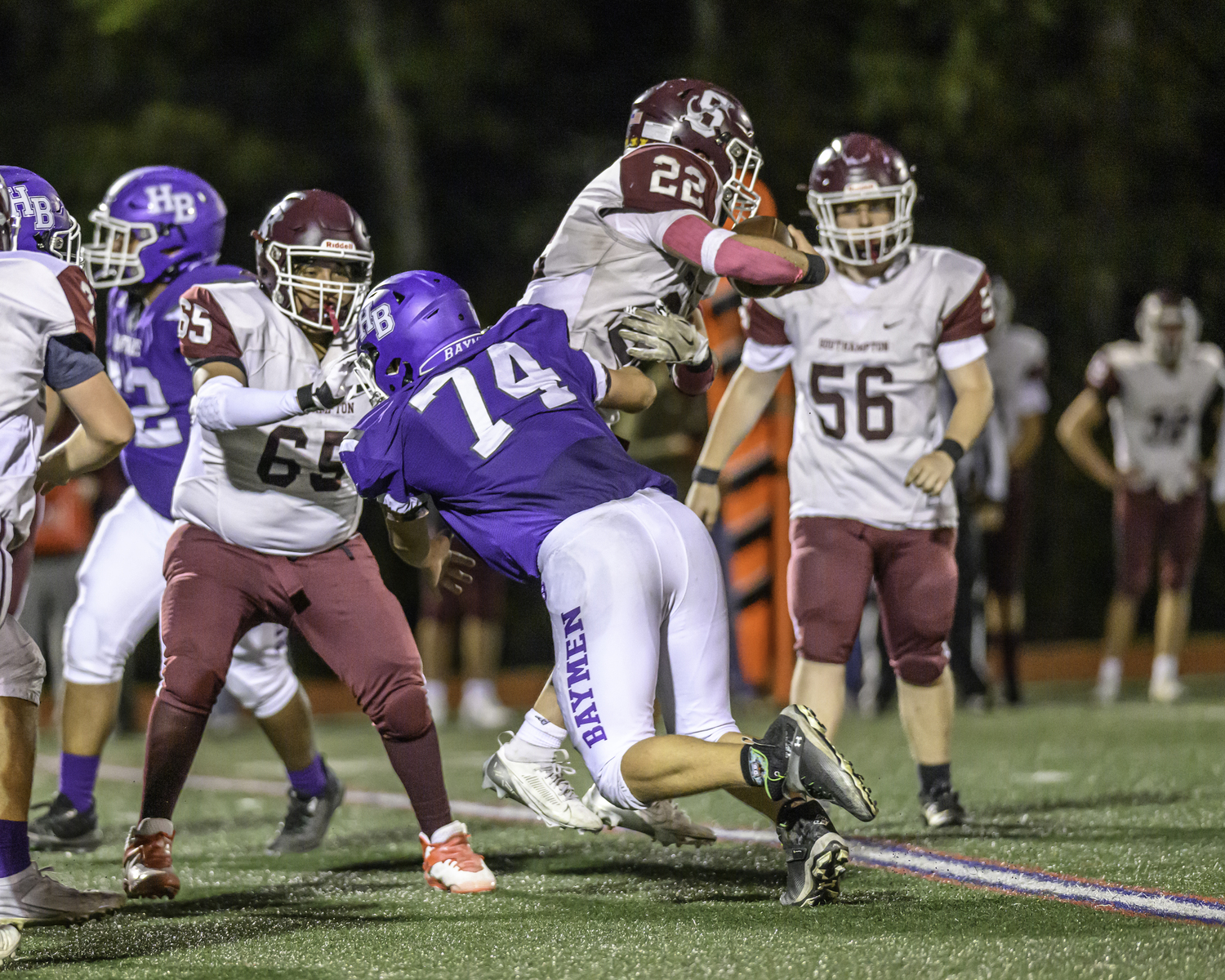 Hampton Bays junior Agron Bytyqi tackles Southampton senior James Dudley.   MARIANNE BARNETT