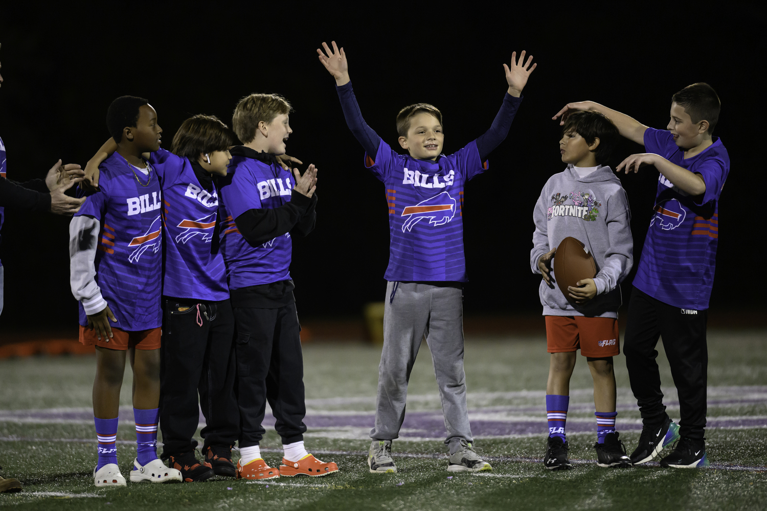 At halftime of Friday night's game, the Hampton Bays Flag Football League was honored.   MARIANNE BARNETT