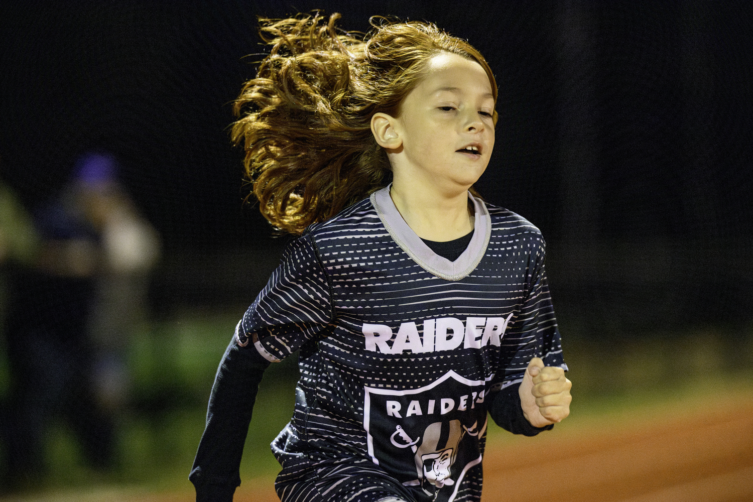 At halftime of Friday night's game, the Hampton Bays Flag Football League was honored.   MARIANNE BARNETT