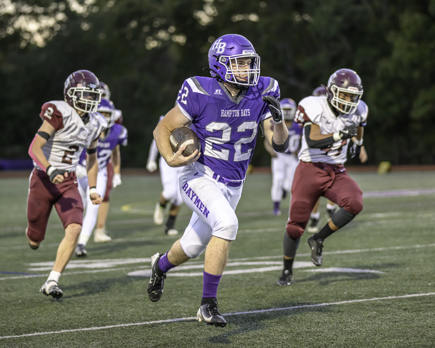 Senior Nate Donahue breaks out for the Baymen's first touchdown of the game in the first quarter of Friday night's game.