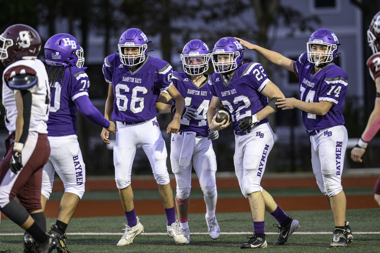 The Baymen celebrate a touchdown.   MARIANNE BARNETT