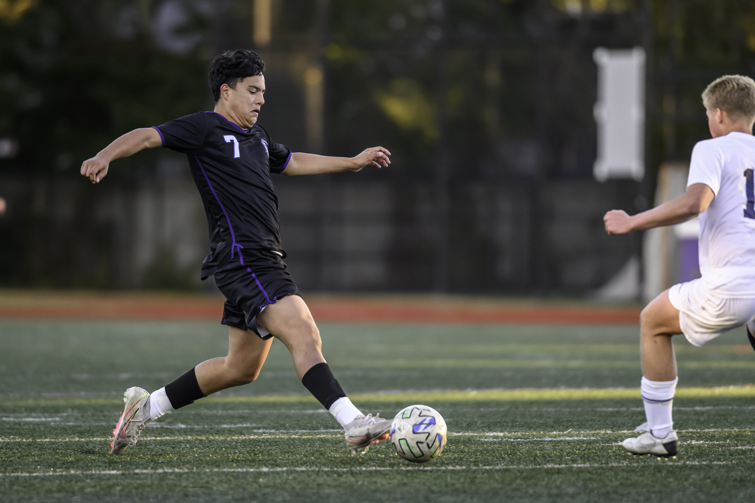 Hampton Bays senior Edie Cabrera tries to keep possession of the ball. MARIANNE BARNETT