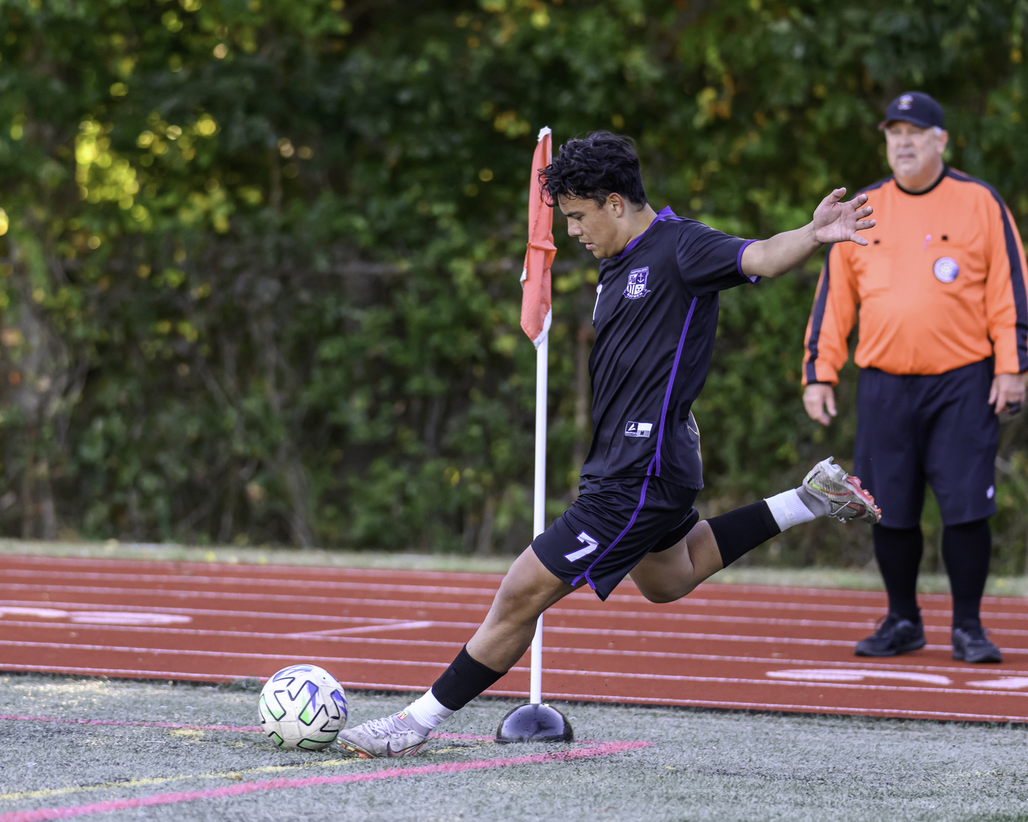 Senior Edie Cabrera takes a corner for the Baymen.  MARIANNE BARNETT