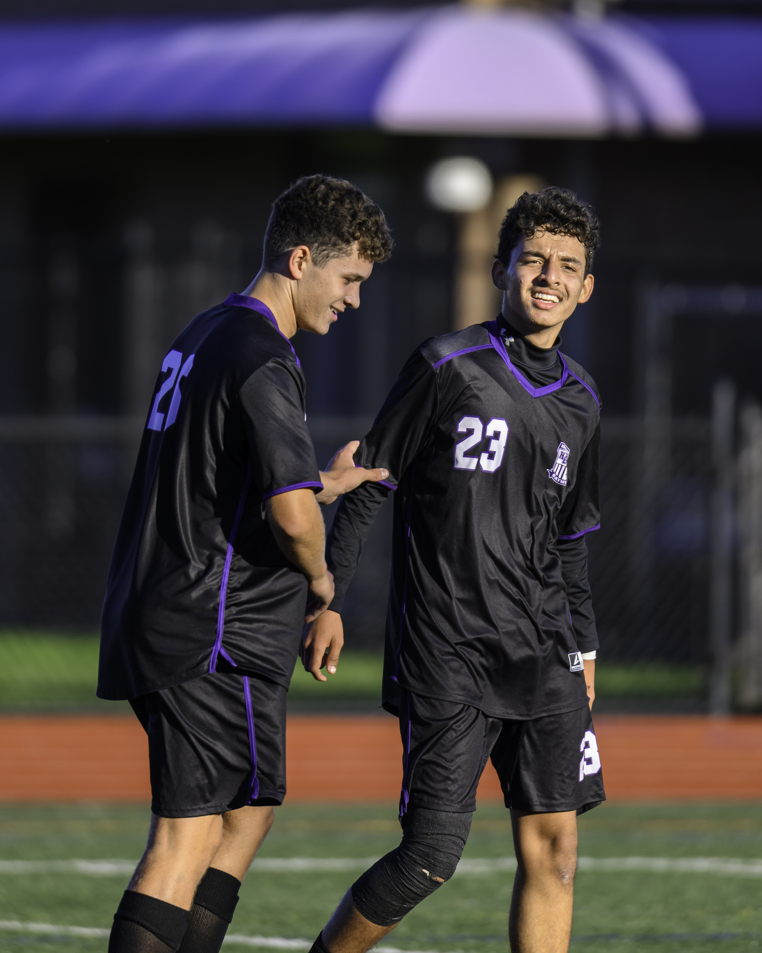 There was a lot of celebrating for Matthew Pozdniakov, left, Luis Grajales and the rest of the Baymen in their lopsided victory over Bayport-Blue Point last week.  MARIANNE BARNETT