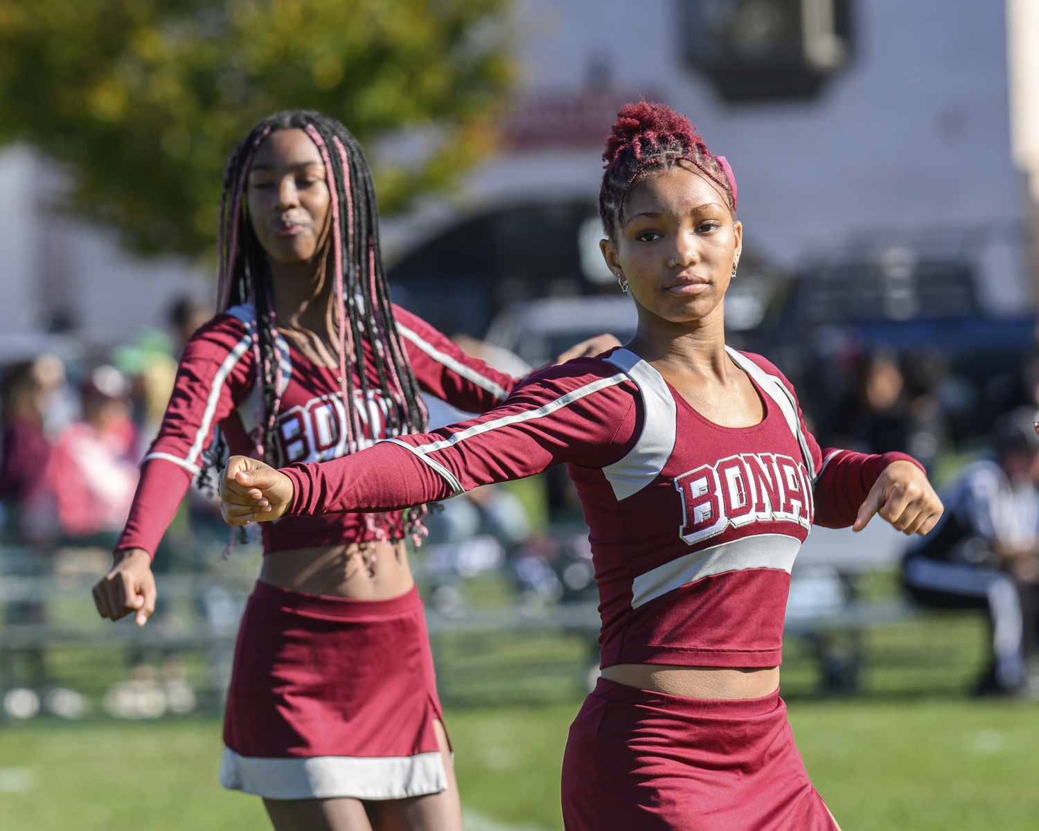 East Hampton High School Cheerleaders during halftime during the Homecoming game on Saturday.  MARIANNE BARNETT