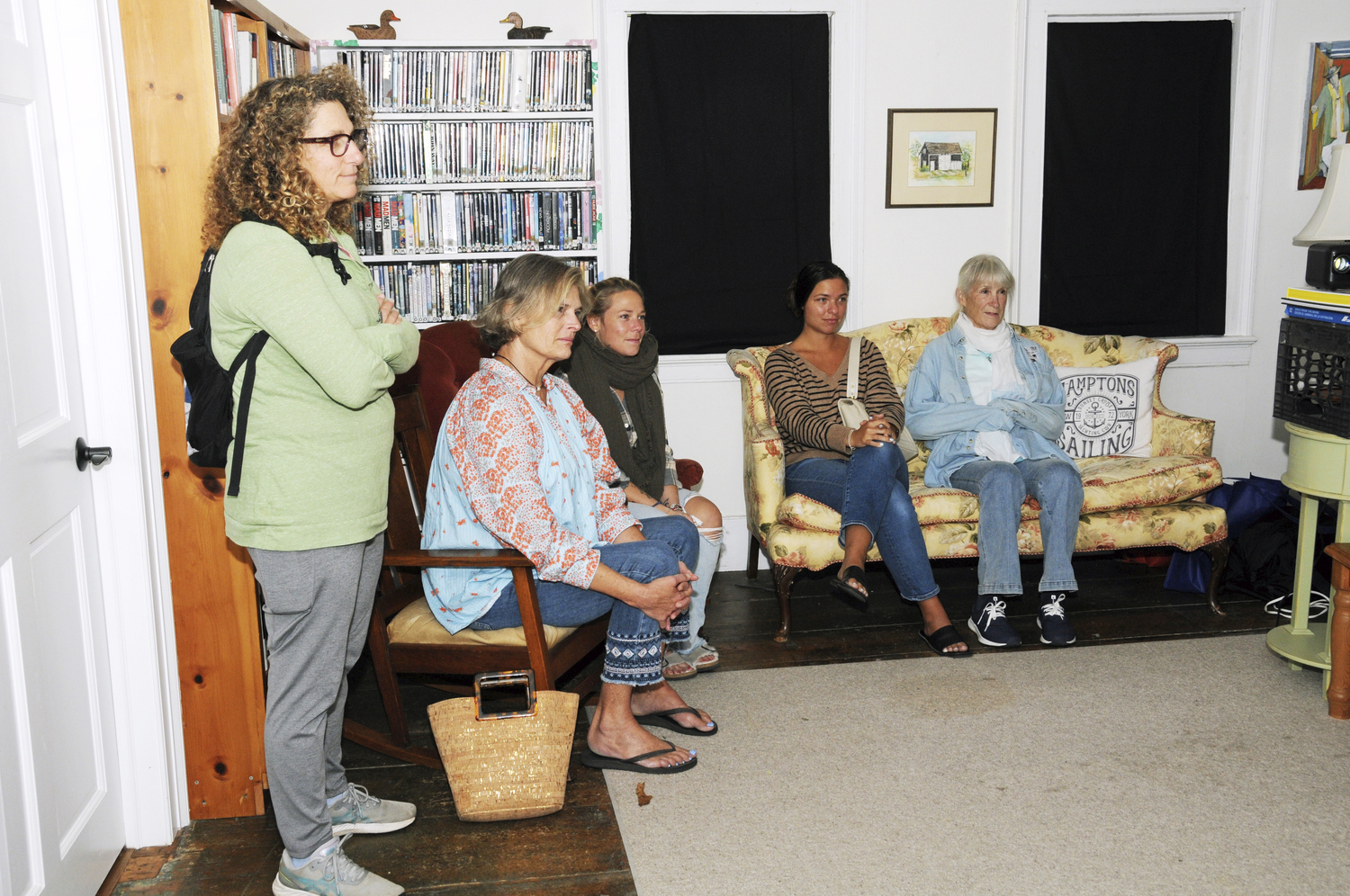 Visitors to Springs Fest this weekend, including Suffolk County Legislator Ann Welker, second from left, view the short film the film 