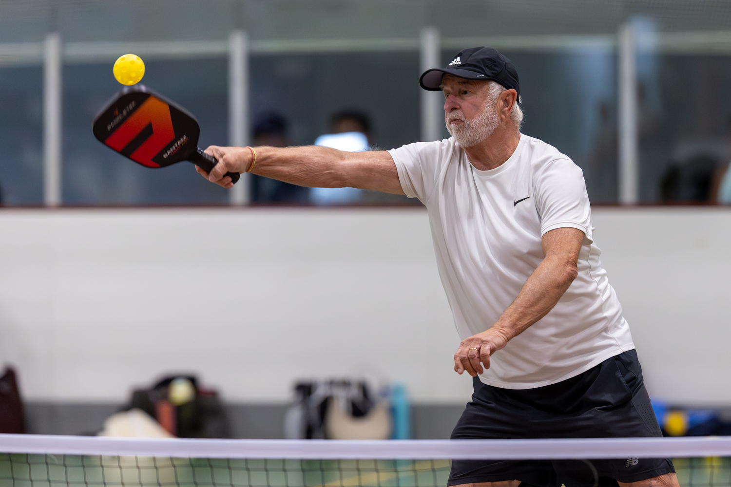 Former U.S. Representative Tim Bishop competing in this year's tournament.   RON ESPOSITO