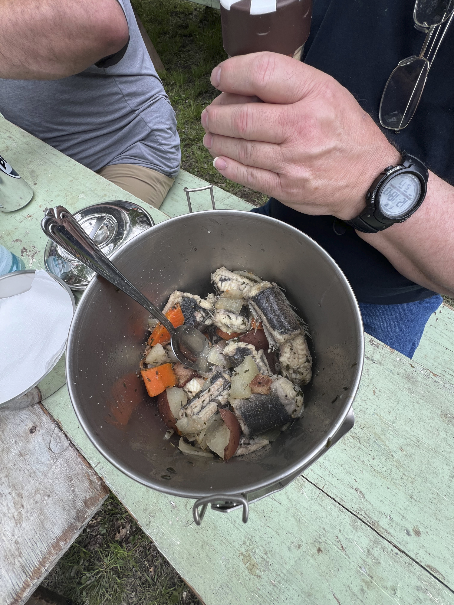 Visitors to the Hunter's Garden sample eel and Manhattan clam chowders cooked in large pots on the site.   DANA SHAW