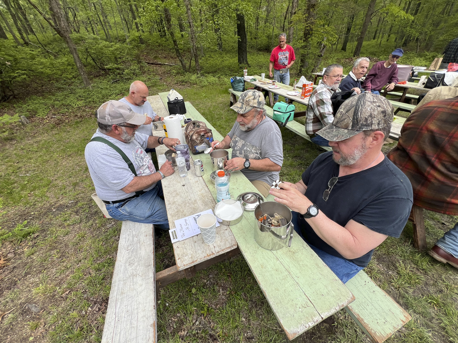 Visitors to the Hunter's Garden sample eel and Manhattan clam chowders cooked in large pots on the site.   DANA SHAW