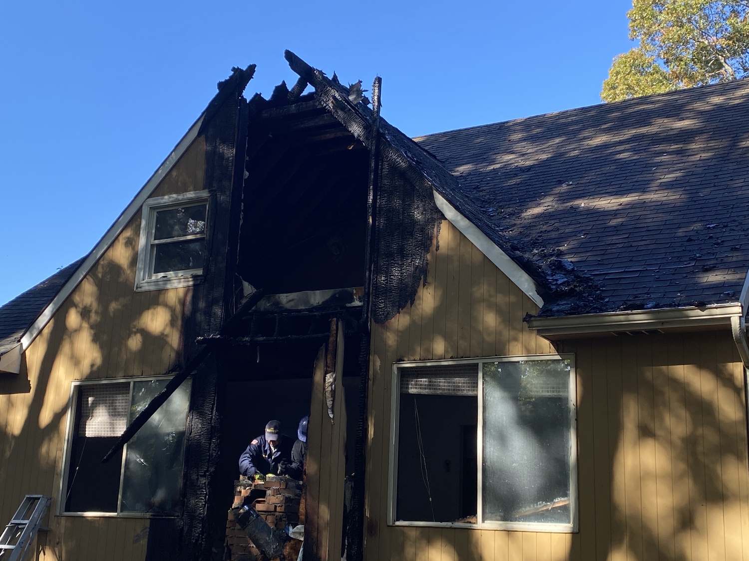 The chimney of the house at 9 19th Street in Springs collapsed soon after firefighters responded to the site. CHRISTOPHER WALSH