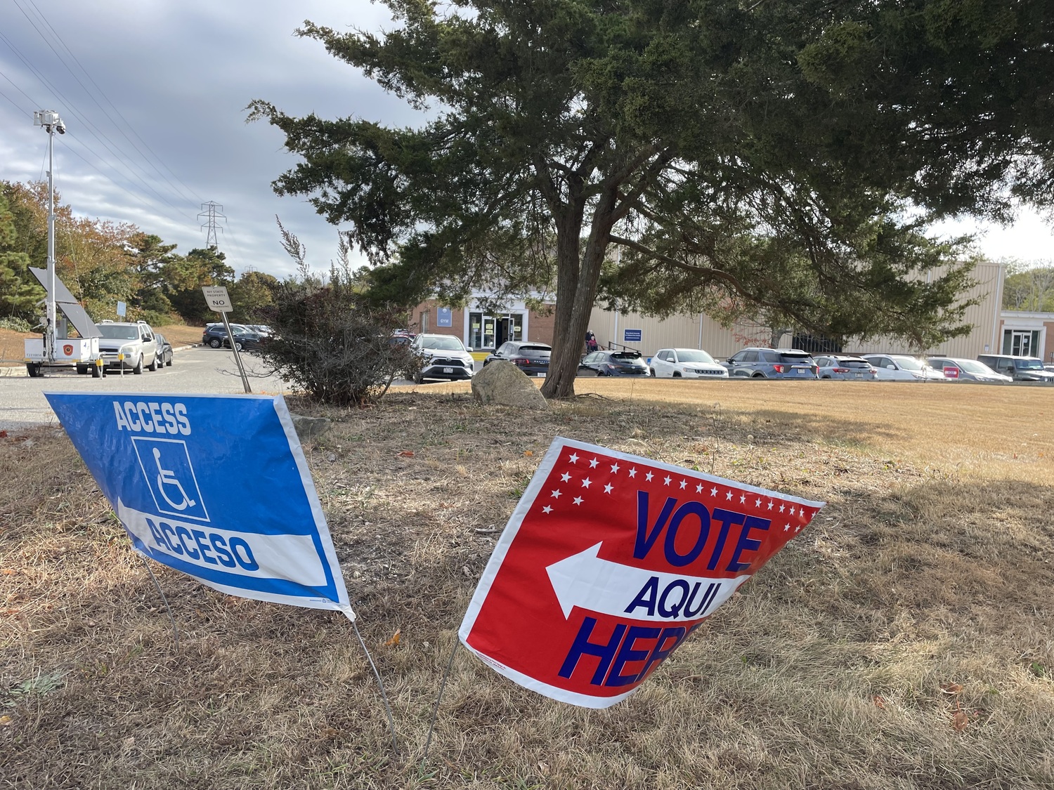 Campaigns signs dotted the landscape outside of Stony Brook Southampton College earlier this week as people showed up for early voting. CAILIN RILEY