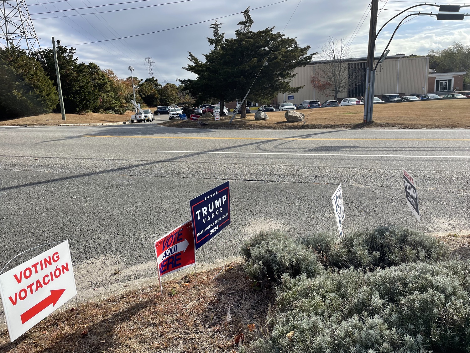 Campaigns signs dotted the landscape outside of Stony Brook Southampton College earlier this week as people showed up for early voting. CAILIN RILEY