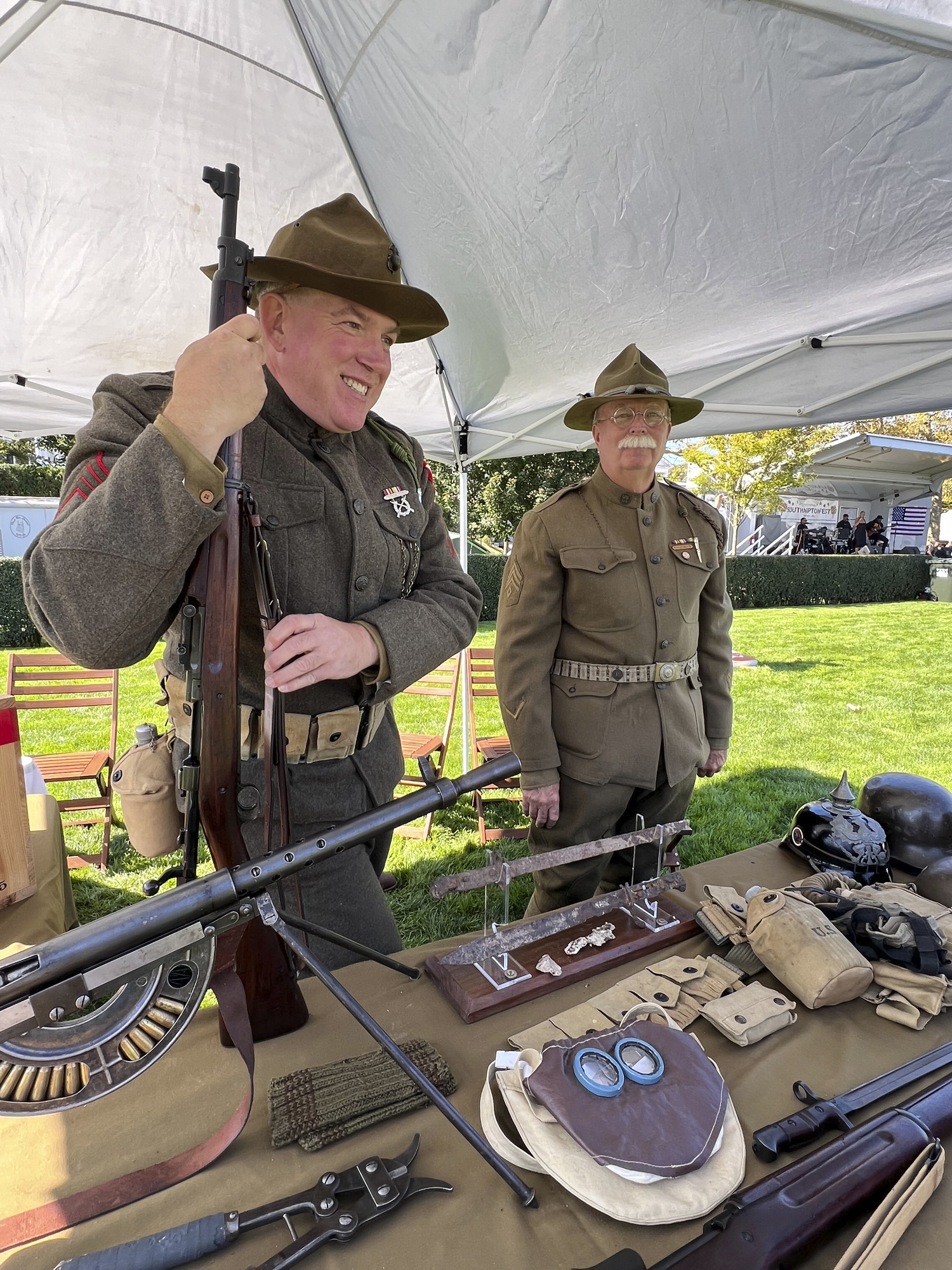 Jim Lennon and Jim Michaud from the Long Island Living History Center at the Southampton History Museum kiosk in Agawam Park.