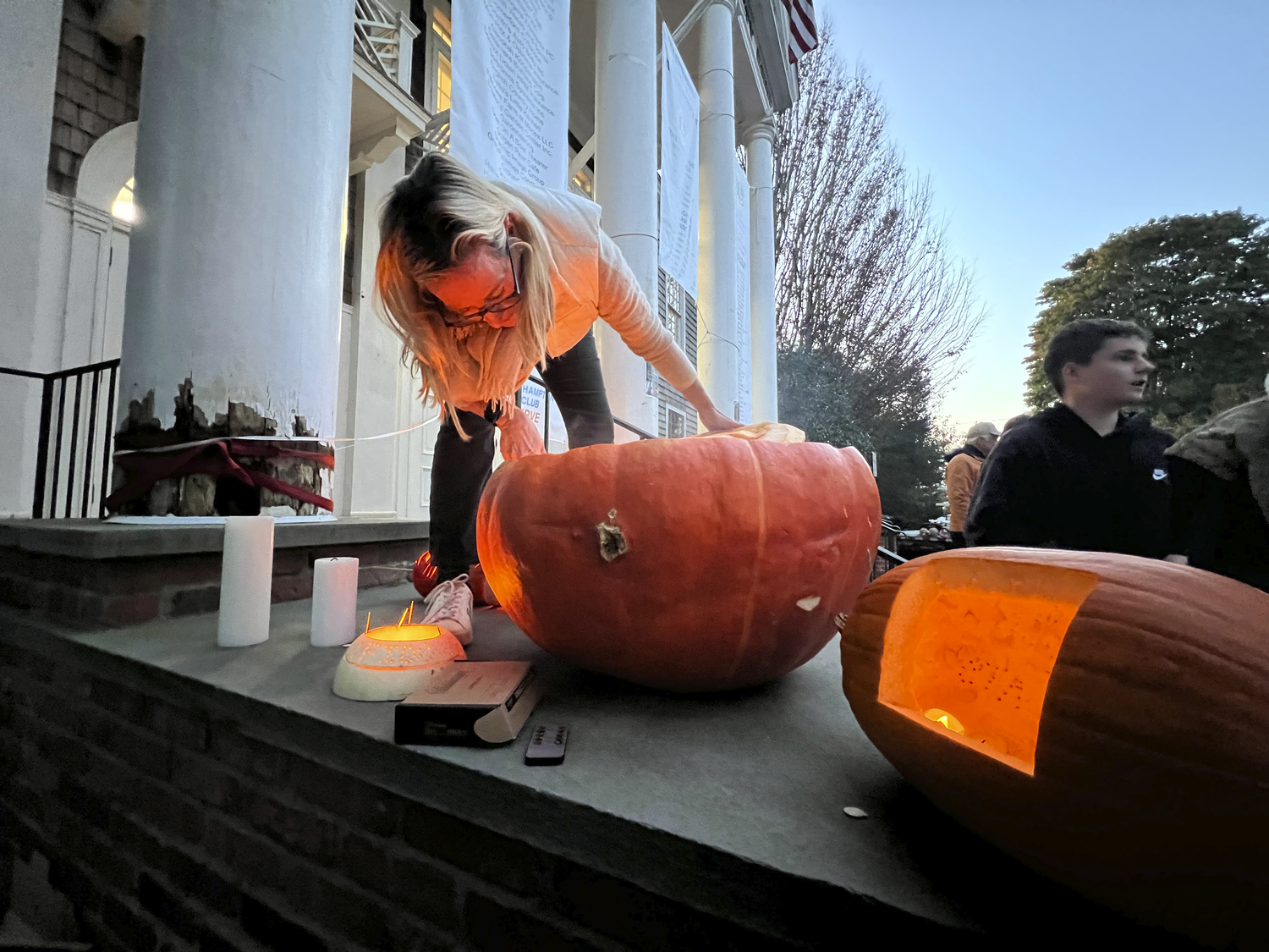 Allison Babcock assembles her Weber Grill, complete with cat kebabs, at the Bridgehampton Lions Club Pumpkin Carving Contest on Monday evening.