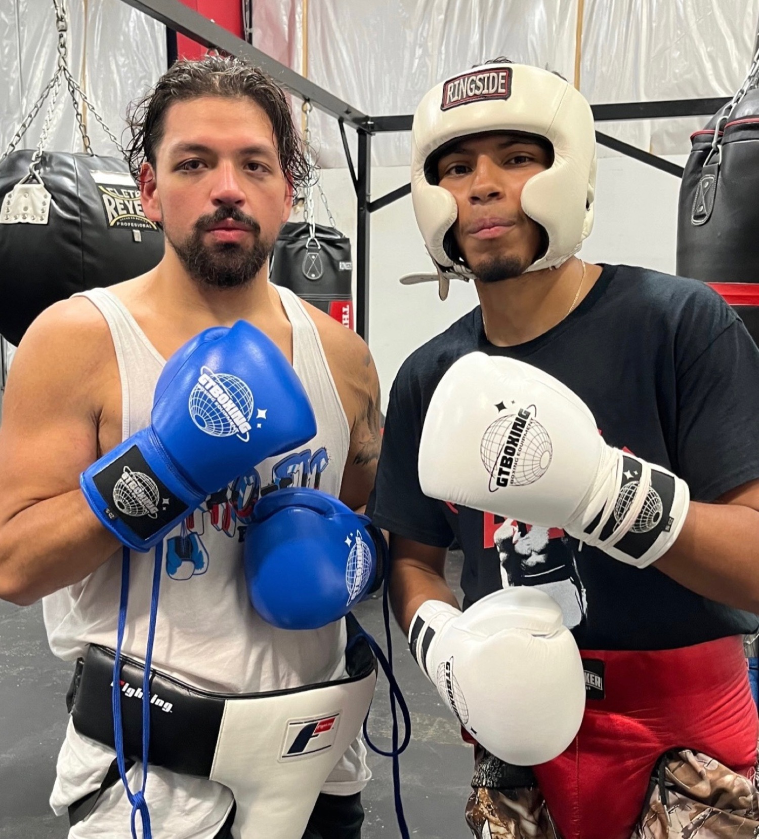 Hill Street Boxing fight team members Kevin Eras and Chris Atancuri. COURTESY CHRIS ATANCURI