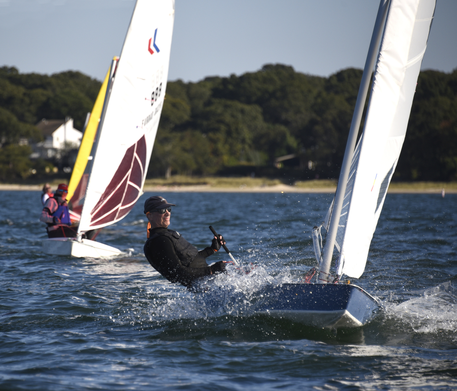 James Merrell’s smile translates: sailboat racing on a glorious day is nothing but fun!  MICHAEL MELLA