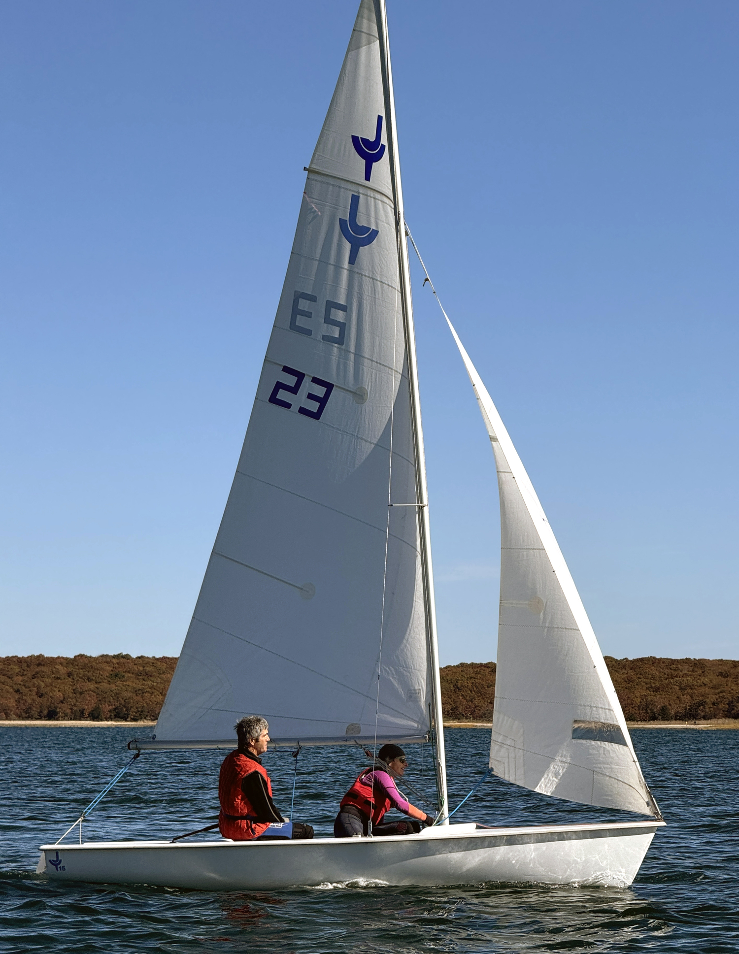 Sag Harbor custom dock builder Dave Whelan finds a fresh beam-reach breeze while Sinéad FitzGibbon, co-owner of Latitude PT across the street from the Breakwater Yacht Club, fine tunes her jib sheet. With two wins, they sailed away with second place overall Sunday.   MICHAEL MELLA