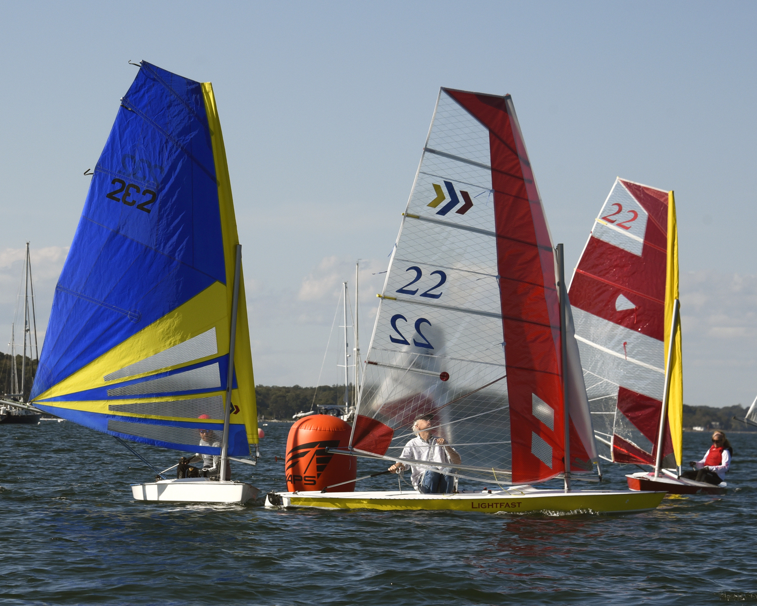 Mark Webber, left, Scott Sandell and Barbara-Jo Howard at the leeward mark.   MICHAEL MELLA