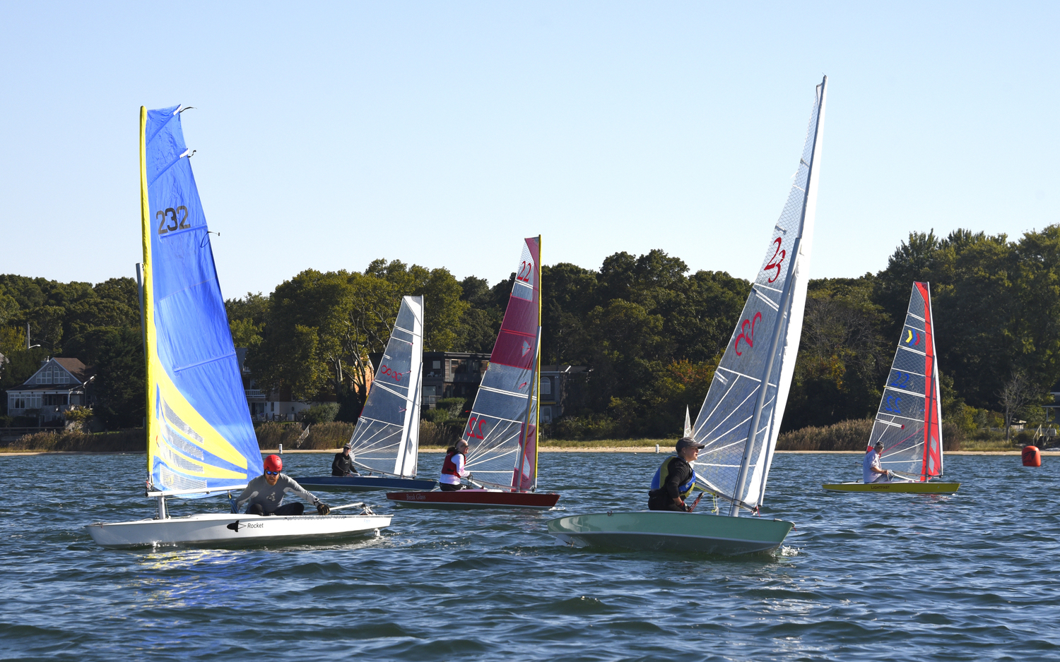 Mark Webber, left, James Merrell, Barbara-Jo Howard, Gloria Frazee and Scott Sandell keeping an eye on each other halfway through the third race of the day.   MICHAEL MELLA