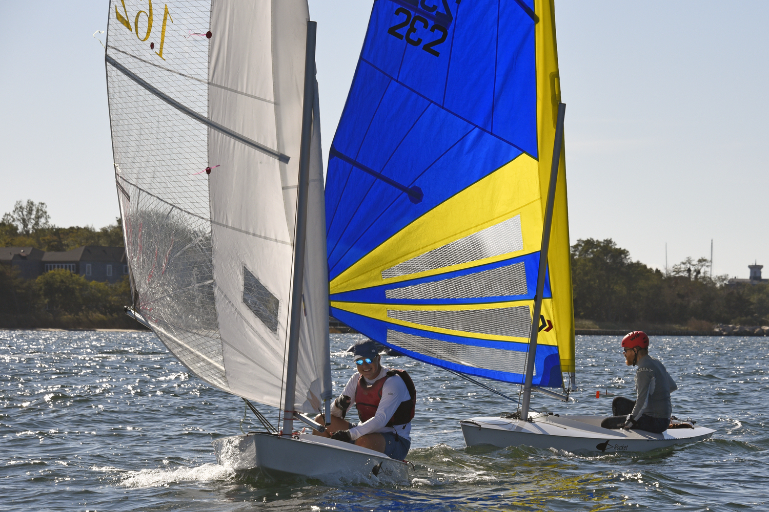 Breakwater Yacht Club's Commodore Nick Gazzolo enjoying his downwind lead over Mark Webber. Nick’s sail number, the ratio between two consecutive Fibonacci numbers equal approximately 1.62, also known as The Golden Ratio.   MICHAEL MELLA