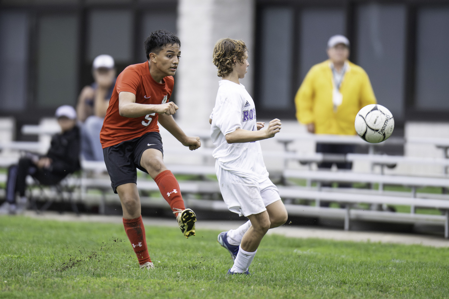 Erick Bautista boots the ball before Port Jefferson's Max Gordon could get to it.  MARIANNE BARNETT