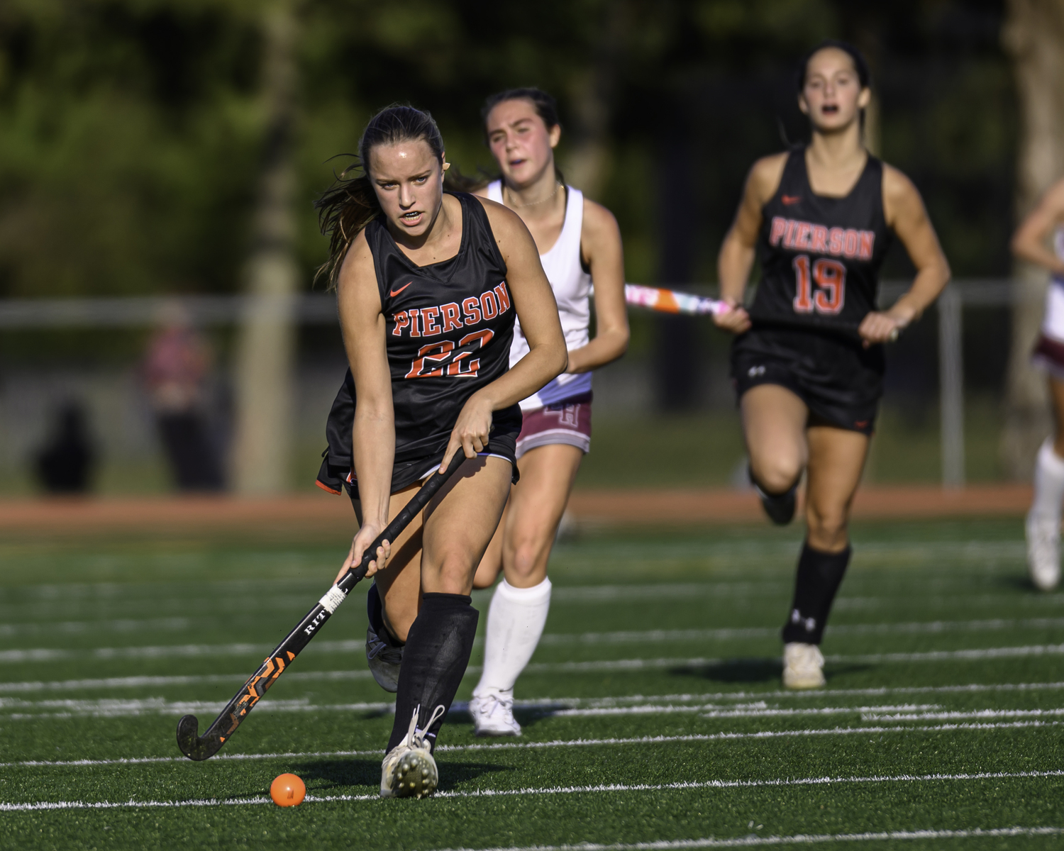 Pierson senior Bella Eldridge moves the ball down the field on her stick.   MARIANNE BARNETT