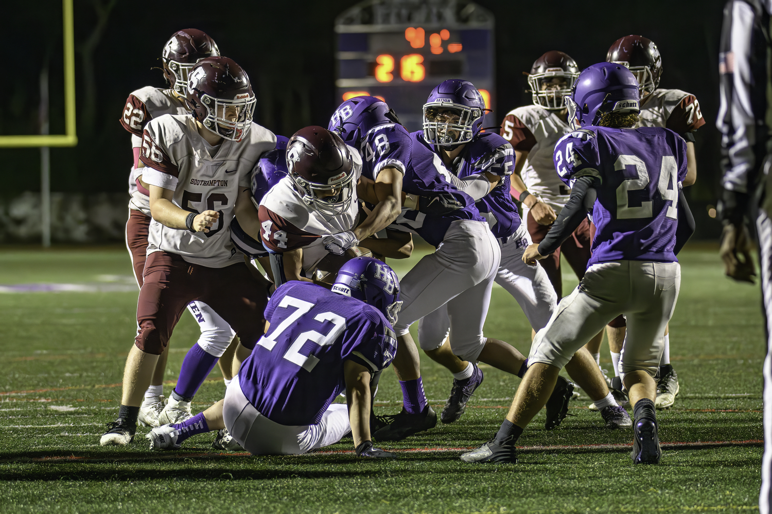 Southampton senior Elder Hernandez barrels into the end zone for the Mariners' first touchdown of the game on Friday night.  MARIANNE BARNETT