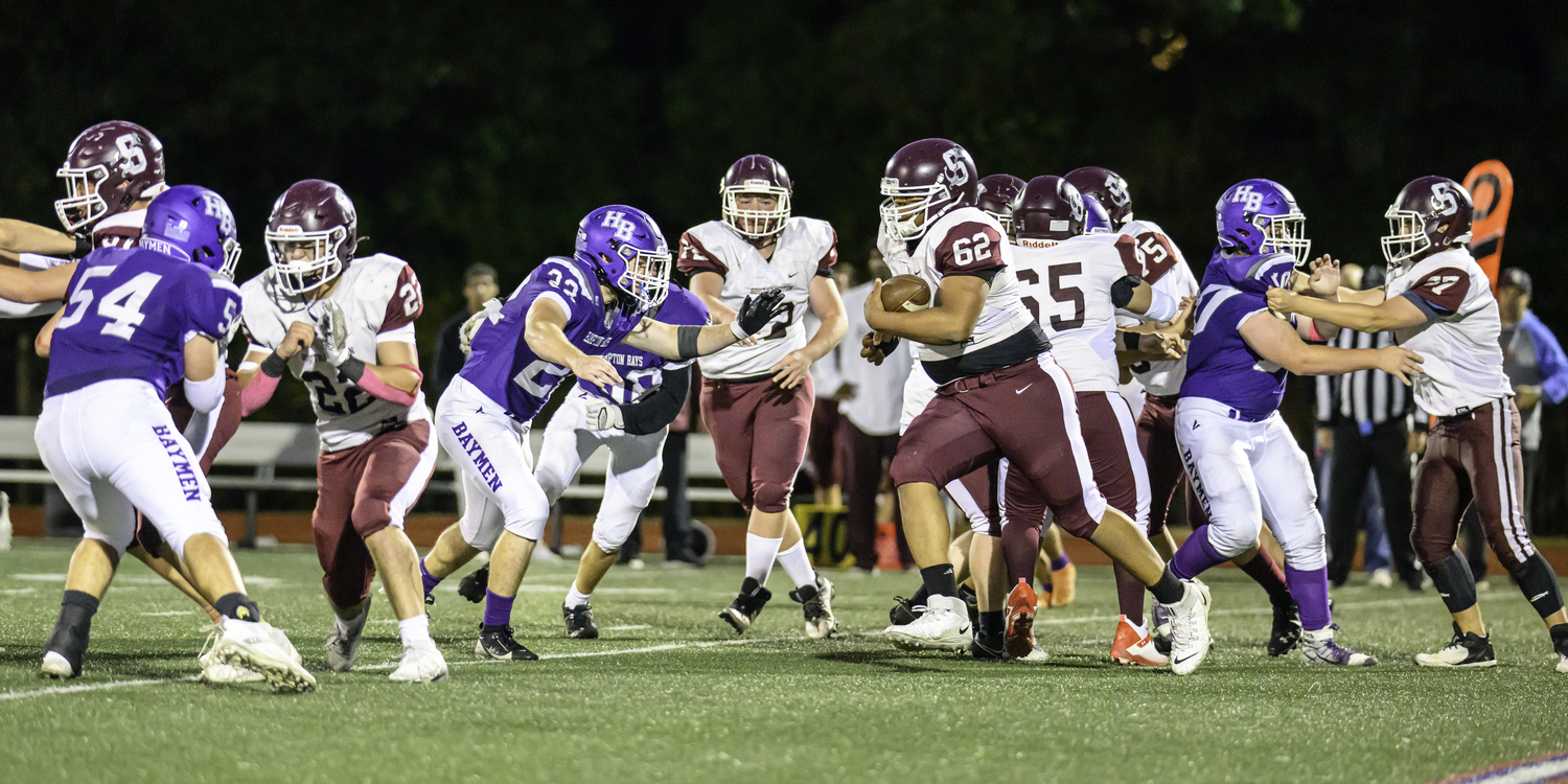 Southampton senior Jackson Garcia takes off with the ball.   MARIANNE BARNETT