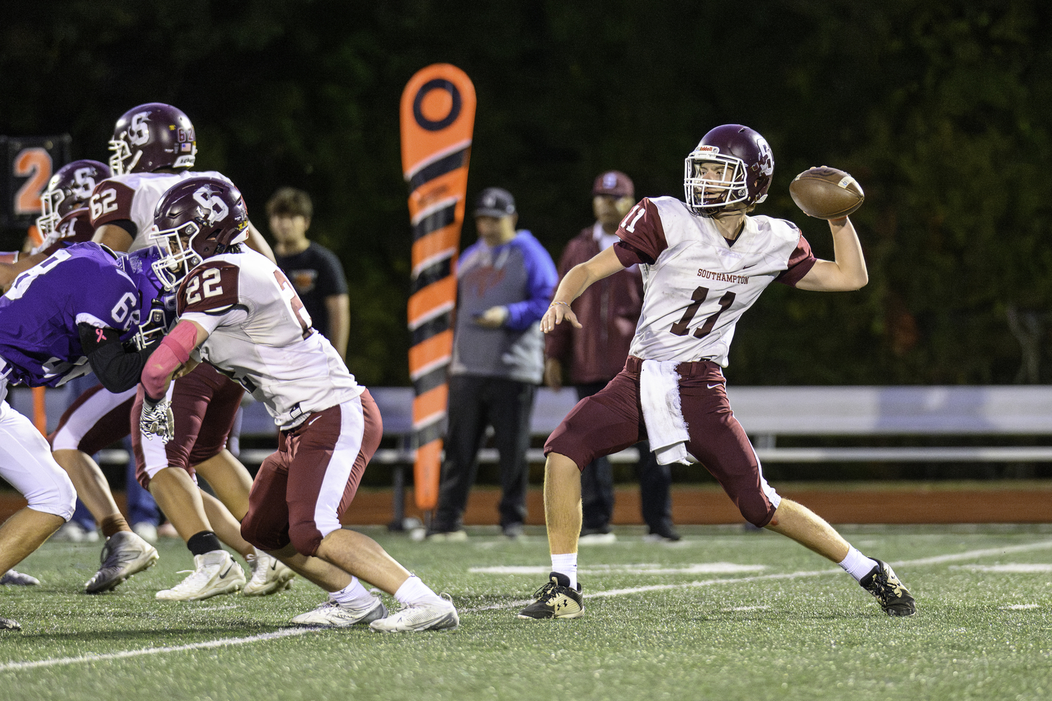 Southampton freshman quarterback Sam Raynor reaches back to pass.  MARIANNE BARNETT