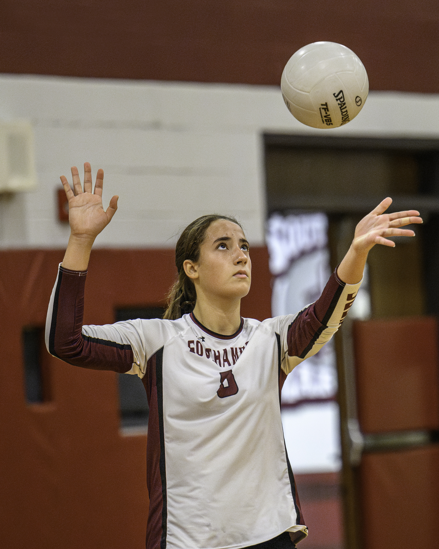 Senior outside and middle hitter Bea Pariz serves. MARIANNE BARNETT