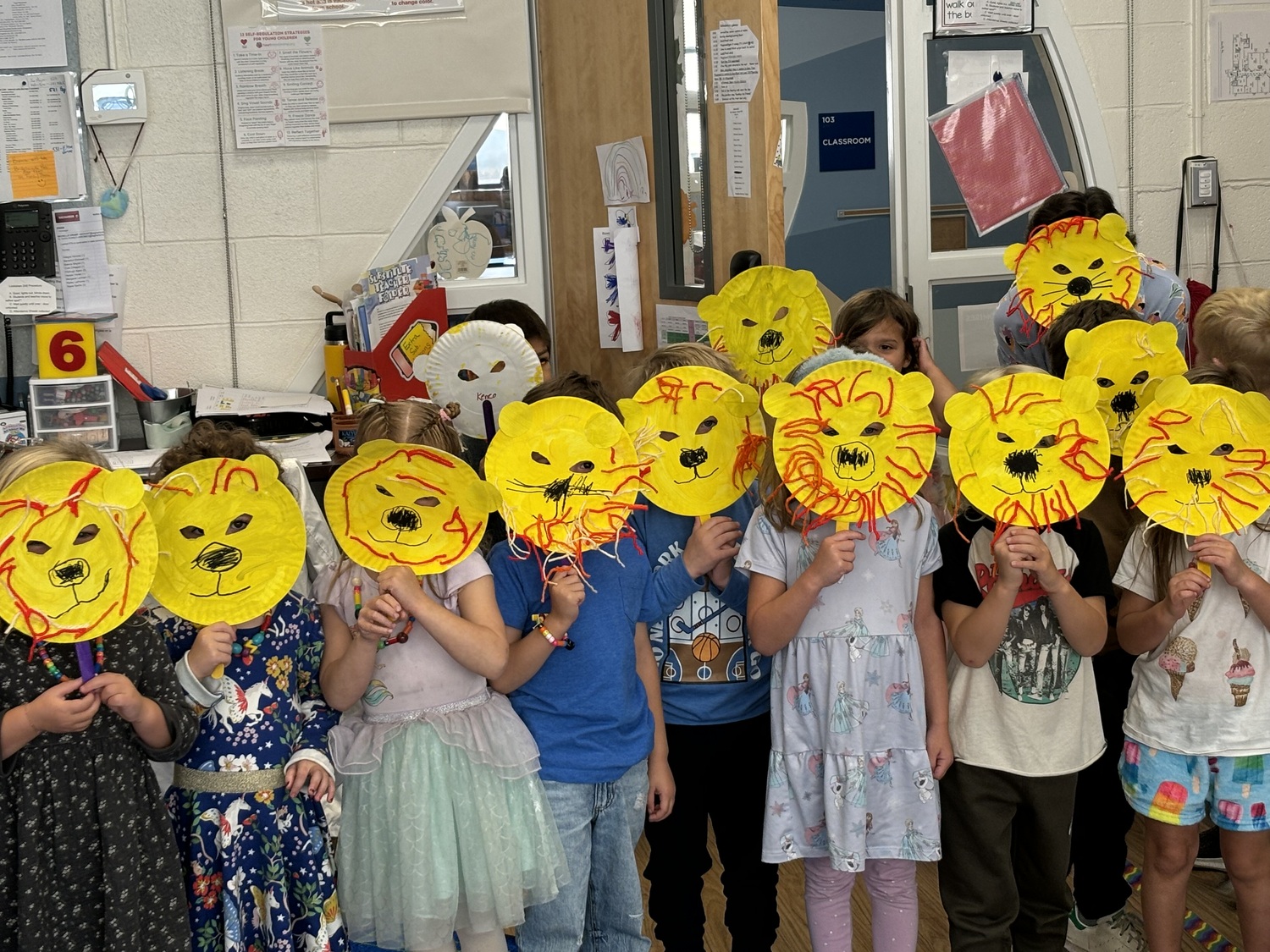 Sag Harbor School District's prekindergarten students in Mindy Reyer’s class are exploring African animals. They learned that lions can be identified by their unique whisker spot pattern, much like human fingerprints. While discovering more about these wild animals, students created lion masks to make the unit engaging. COURTESY SAG HARBOR SCHOOL DISTRICT