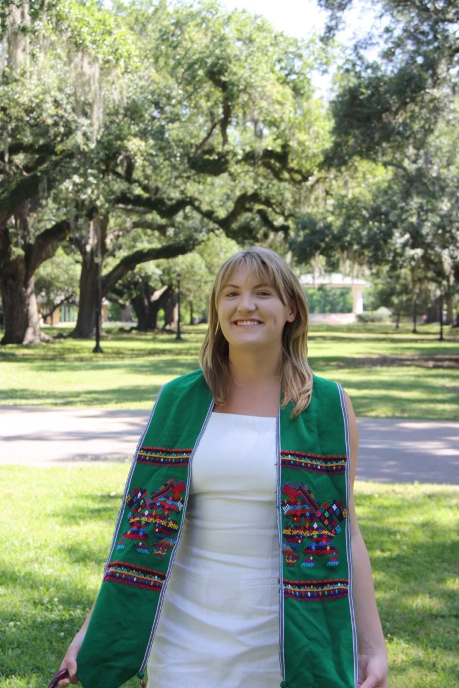 Sarah Bready wears a graduation stole for her major in Latin American Studies. It was hand-woven by a women's collective in Guatemala. COURTESY SARAH BRADY