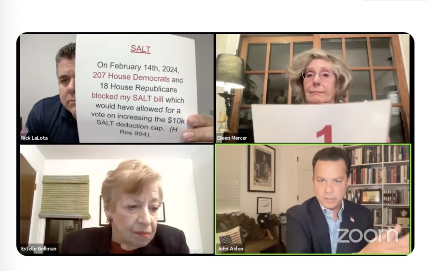 Representative Nick LaLota, top left, repeatedly held a sheet of paper to the camera when his opponent, John Avlon, was speaking. Estelle Gellman, the moderator, eventually told him to stop.