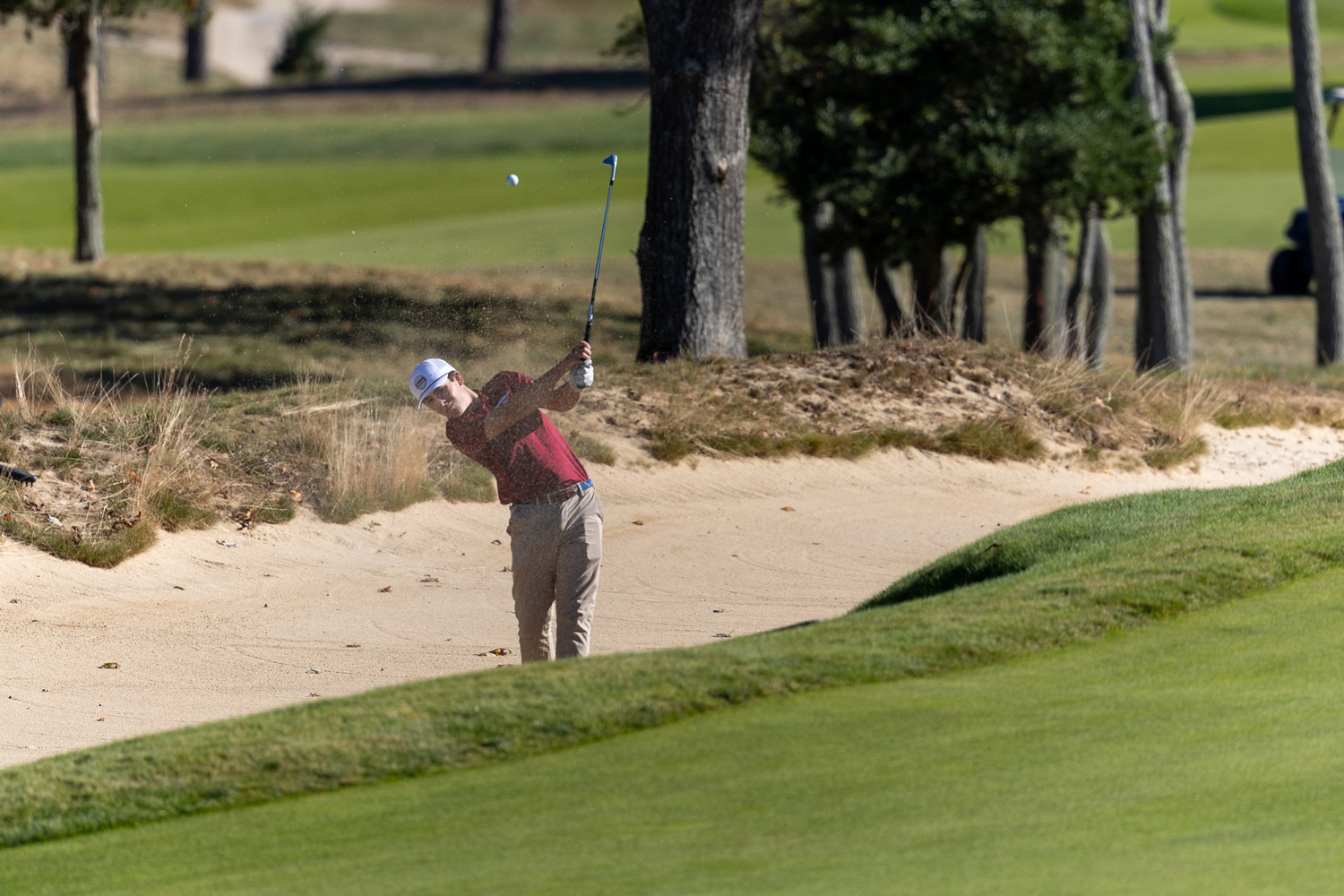 Southampton junior Colin DiLaleo tries to get himself out of a bunker.  RON ESPOSITO