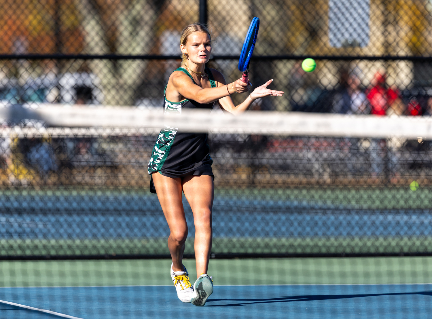 Sophomore Maddie Montgomery returns the ball. RON ESPOSITO