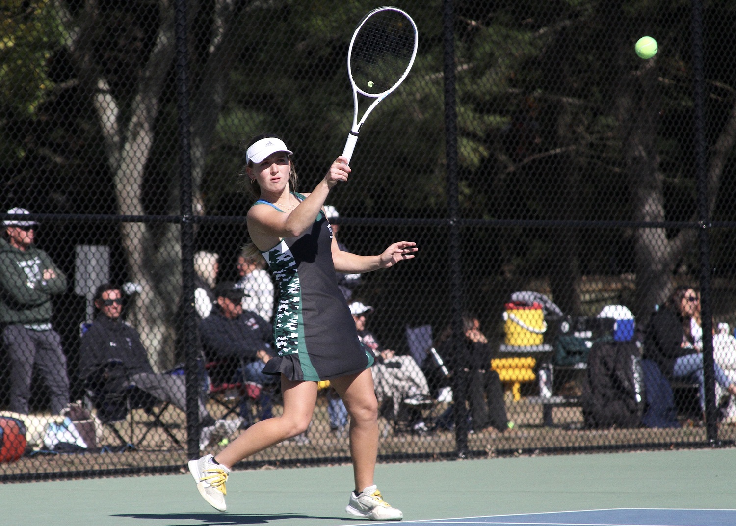 Senior Matilda Buchen sends the ball back over the net. DESIRÉE KEEGAN