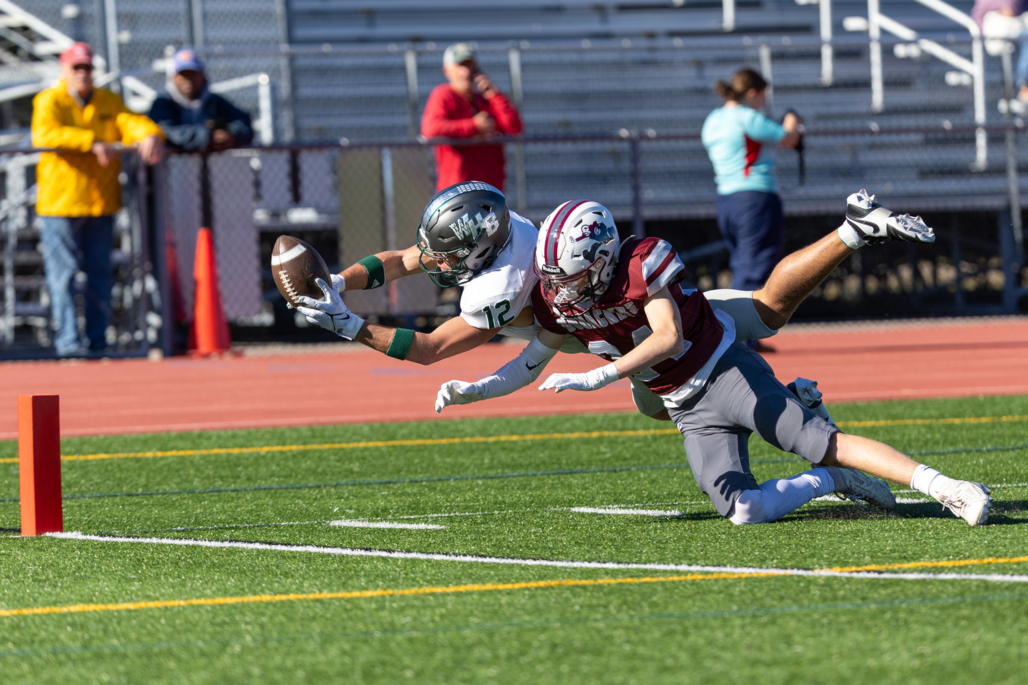 Westhampton Beach senior Brody Schaffer dives toward the goal line and scores.   RON ESPOSITO