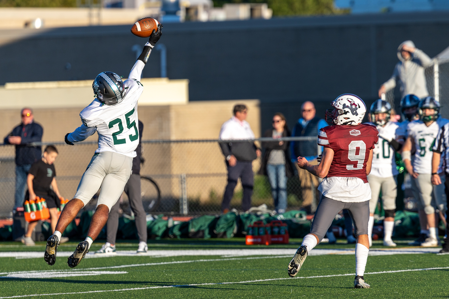 Westhampton Beach sophomore Nicholas Simone goes up for a intended for East Hampton junior Charlie Stern.   RON ESPOSITO