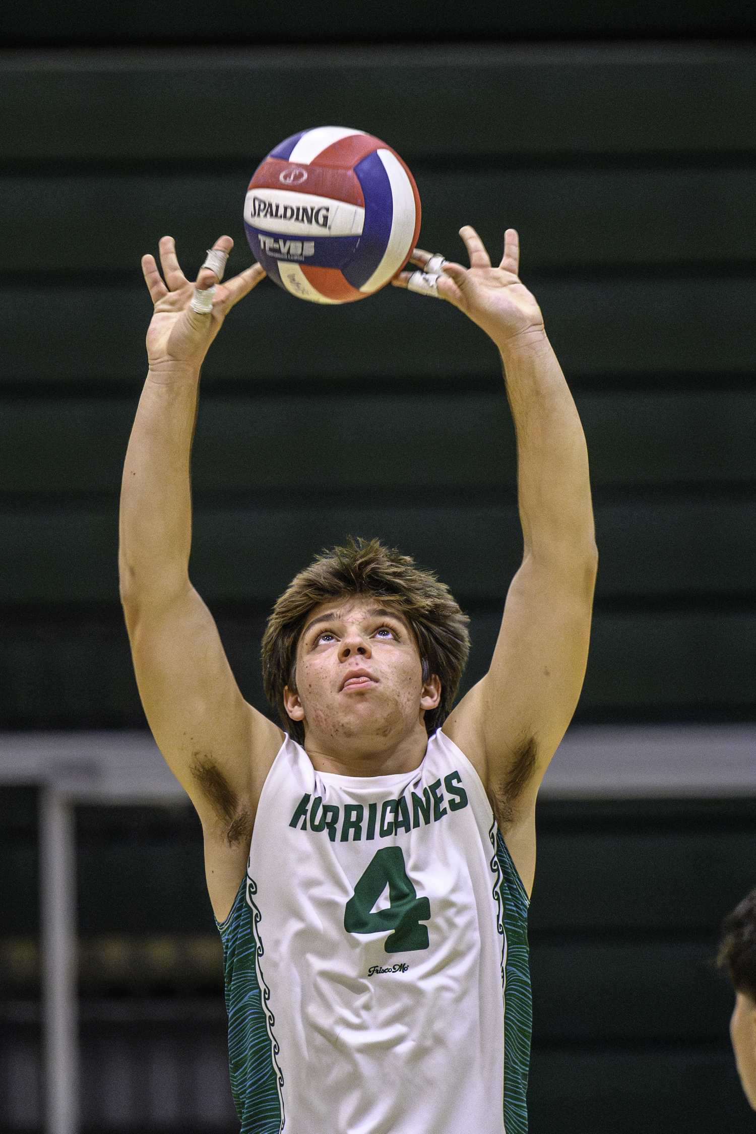 Senior setter Gavin Cole sets up a play. MARIANNE BARNETT