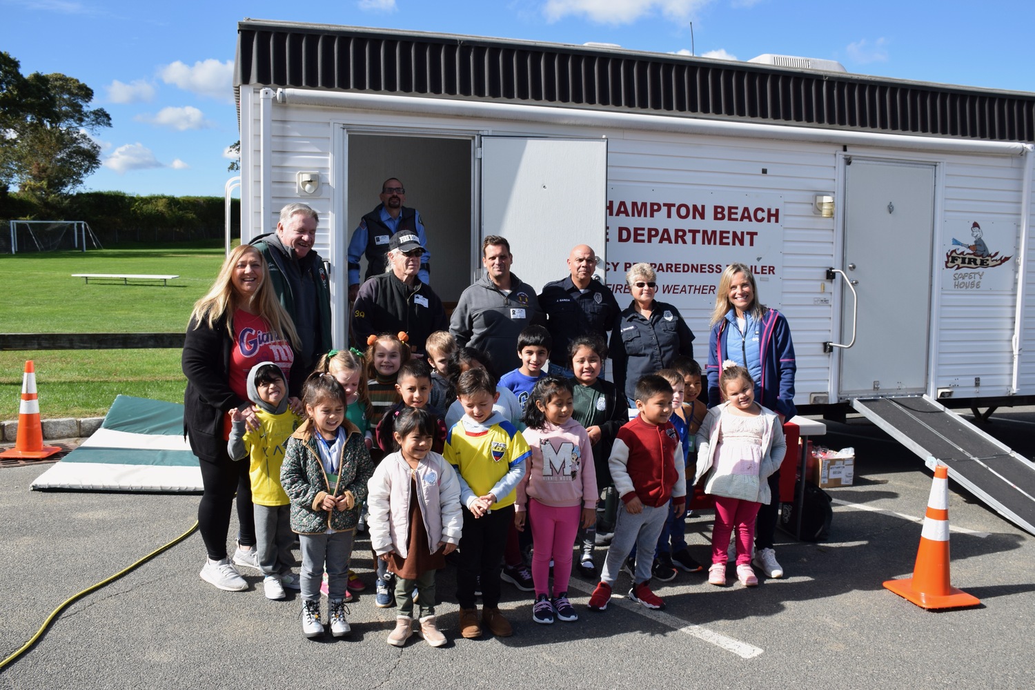 As part of Fire Prevention Week, Westhampton Beach Elementary School students participated in fire safety lessons with members of the Westhampton Beach Fire Department. Students learned about general fire safety, smoke alarms and fire extinguishers and practiced calling 911 and jumping out the window of the fire department’s smoke house simulator. COURTESY WESTHAMPTON BEACH SCHOOL DISTRICT